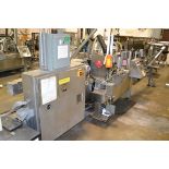 Trine model 5500G/S wraparound plastic film labeler, serial number 06955180, set up for a 211/
