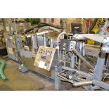 Trine model 5500G/S wraparound plastic film labeler, serial number 2-88-5500-125G/S, set up for a