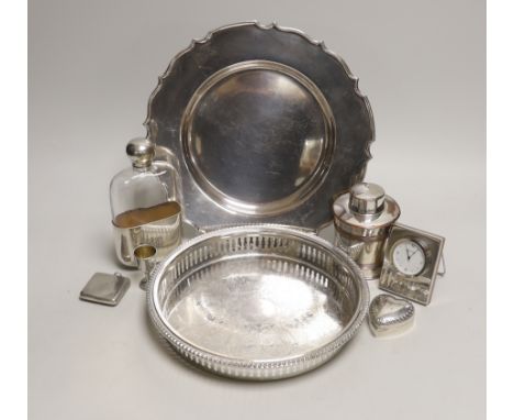 A George V silver small compact, a silver mounted timepiece, small silver tot and silver heart shaped pill box, together with