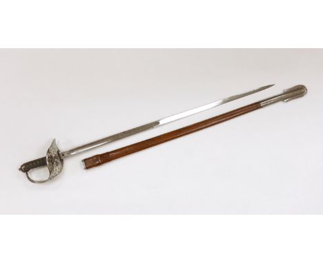 An Edward VII infantry officer's sword in leather scabbard, blade 85cm