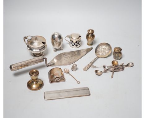 A collection of assorted small silver including condiments, spoons, egg cup, pill box, comb, Tiffany &amp; Co pen, dwarf cand