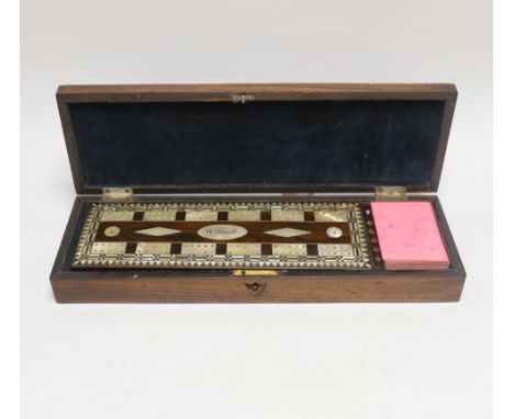 A mother of pearl inlaid rosewood cased cribbage set, with related letter, 1832