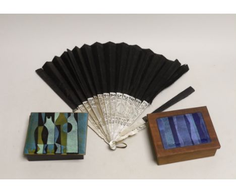 A mother of pearl guard fan and two enamel topped boxes, largest enamel topped box 12.5cm x 10cm