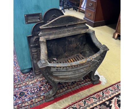 A 19th century cast iron bow front fire grate, width 56cm, depth 28cm, height 61cm together with a cast iron fire back