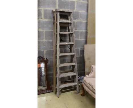 Two vintage pine step ladders, larger height 186cm