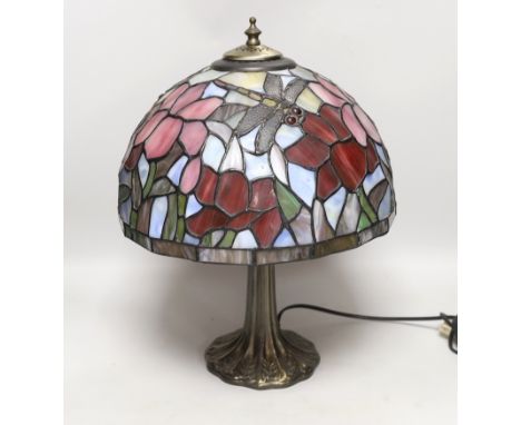 A reproduction Tiffany lamp, leaded glass shade with floral decoration and dragonflies, 40cm