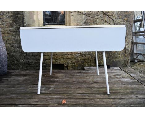 A vintage Formica and metal framed drop flap kitchen dining table. H.70 W.110 D.60cm (ext.110cm) 