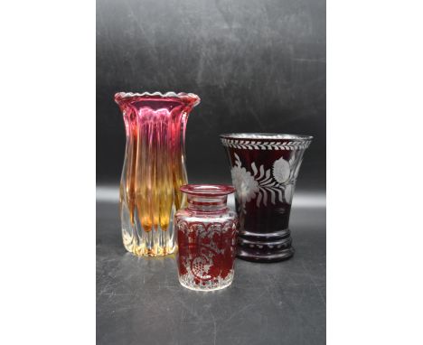 A collection of three vintage glass vases. Including an Art Deco multicoloured vase with a scalloped edge detail and two Vict