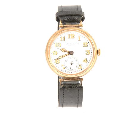 Vintage 9ct gold cased trench watch, enamelled dial signed J W Benson, London, screw back case, Swiss 16 jewel movement, 35mm