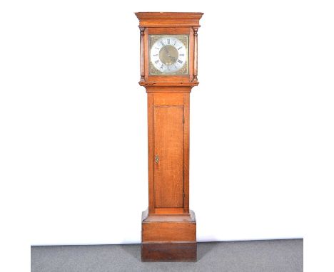 Oak longcase clock, hood with moulded cornice, trunk with long door, plinth base, (adapted), 12" brass dial with cast spandre