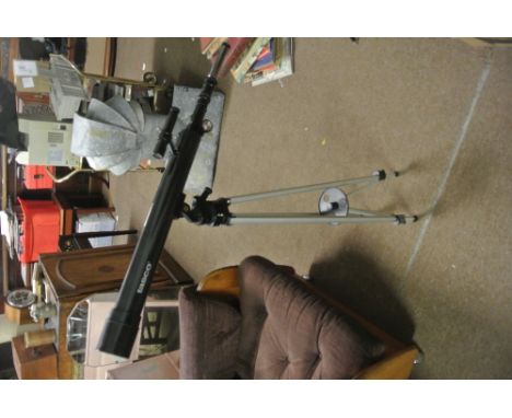 COLLECTABLES - A modern Tasco telescope on tripod.