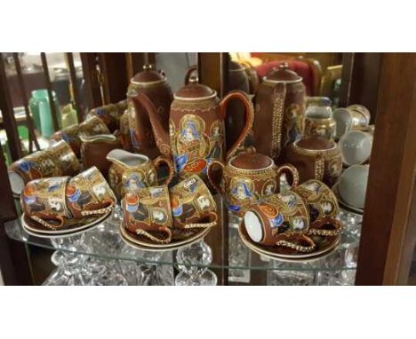 CERAMICS - A vintage Geisha girl teaset to include a teapot, milk jug, sugar bowl & 6 cups with saucers.