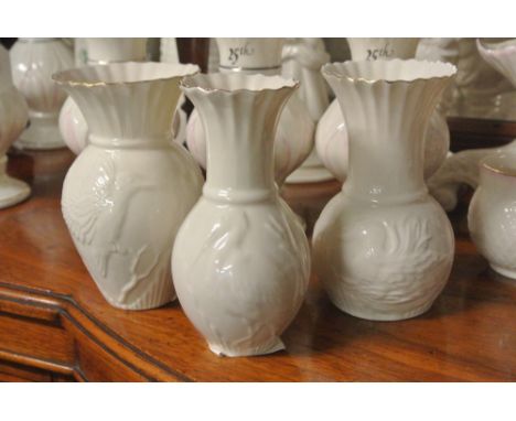 BELLEEK/CERAMIC/IRISH: A  collection of 3 Belleek collectors society edition bird vases. All in plain cream each with a diffe