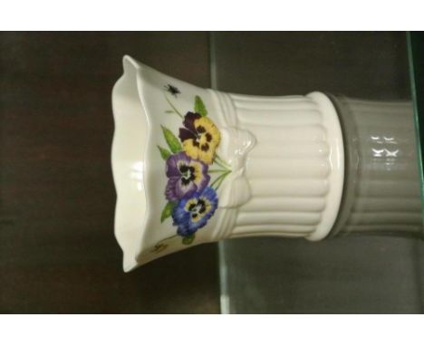 BELLEEK/CERAMIC/IRISH: A pretty Belleek enchanted garden votive/candle holder. Floral pansy design with simple tied bow motif