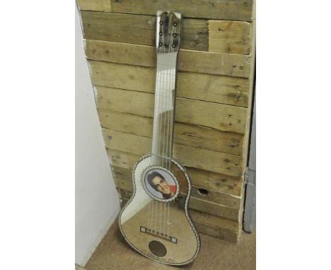 COLLECTABLE - A vintage Elvis Presley mirror in the shape of a guitar, reading 'I'm Elvis' Greatest Fan'. Measures 99cm long.