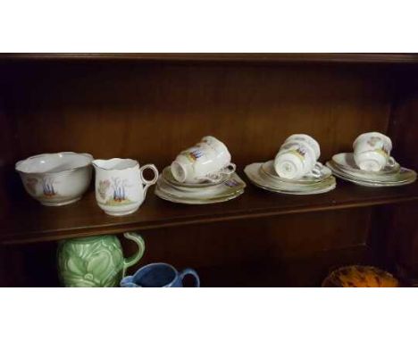 CERAMICS - A beautiful tea set produced by Melba Bone china to include 5 cups, 6 saucers, 6 side plates, a milk jug & a sugar