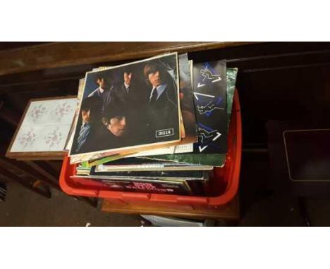 VINYL/ RECORDS - A large collection of albums with artists to include the Rolling Stones, Roxy Music, Leo Sayer etc.