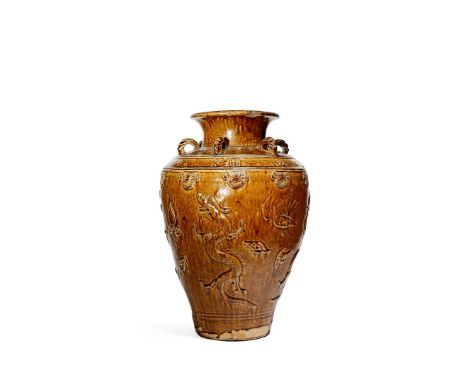 A LARGE CHINESE BROWN GLAZED MARTABAN JAR, MING DYNASTY The tapering ovoid body decorated in relief with dragons, cranes and 