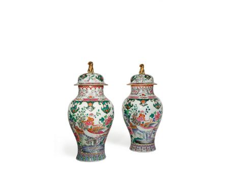 A PAIR OF SAMSON FAMILLE ROSE VASES AND COVERS, 19TH CENTURY Each brightly enamelled with a pair of colourful phoenix, with o