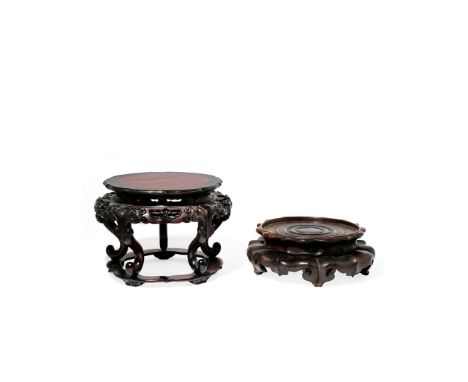 TWO LARGE CHINESE HARDWOOD STANDS, 19TH CENTURY One raised on five scroll legs and with a burr wood panel to the top , the ot