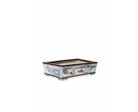 A CHINESE CANTON ENAMEL RECTANGULAR JARDINIERE, 18TH CENTURY Painted to the longer sides with panels of scholars with attenda