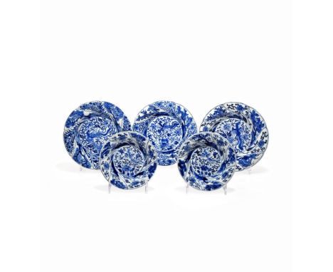 FIVE CHINESE BLUE AND WHITE DISHES, KANGXI 1662-1722 Comprising three larger and two saucer dishes, each painted to the well 