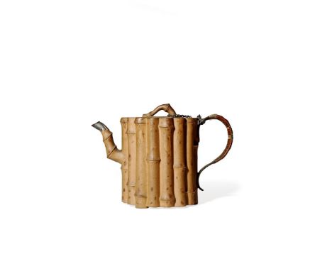 A CHINESE YIXING TEAPOT AND COVER, 18TH CENTURY The cylindrical body modelled as a bundle of bamboo, the finial and spout for