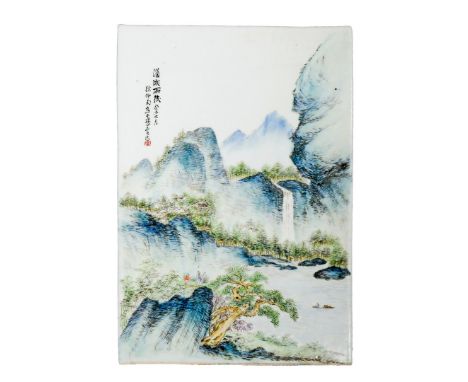 A CHINESE PORCELAIN RECTANGULAR PLAQUE, 20TH CENTURY Painted with an extensive mountain landscape, with two small figures ove