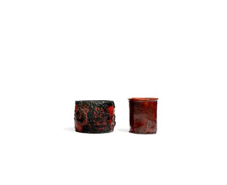 A JAPANESE CERAMIC WATER POT, MIZUZASHI, 19TH CENTURY The cylindrical body with a flared neckrim, decorated with a burnt oran