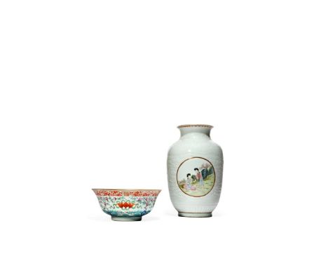 A CHINESE FAMILLE ROSE OVOID VASE, REPUBLIC PERIOD Painted with two roundels containing ladies in fenced gardens, with blosso