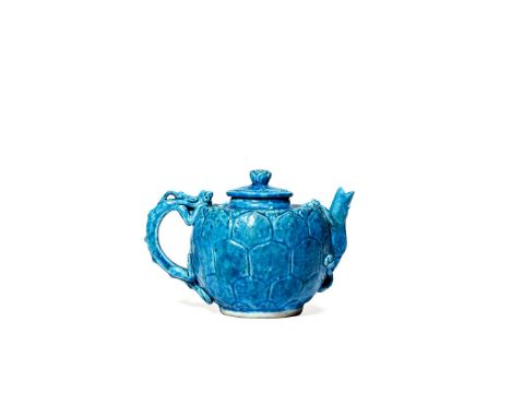 A CHINESE TURQUOISE GLAZED TEAPOT AND COVER, KANGXI 1662-1722 The spout modelled as a gecko, the handle as a sinuous dragon, 