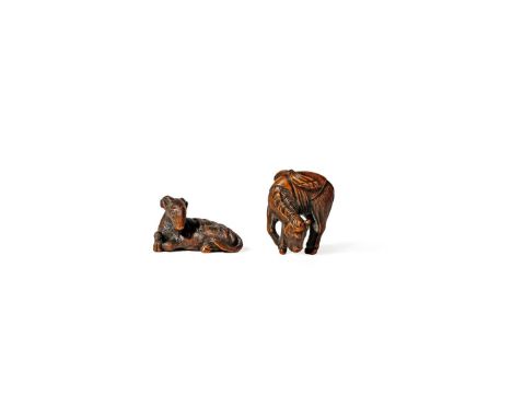TWO JAPANESE WOOD NETSUKE, 19TH CENTURY One depicting a recumbent goat, its head turned to sinister, signed Shugetsu in an ob
