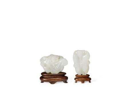 TWO SMALL CHINESE WHITE JADE CARVINGS, 19TH/20TH CENTURY One formed as a lotus seed pod, with a water chestnut fruit, ling ji