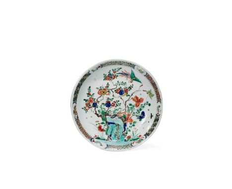 A CHINESE FAMILLE VERTE DISH, KANGXI 1662-1722 Painted with a pheasant perched on rocks amongst flowering branches of peony a