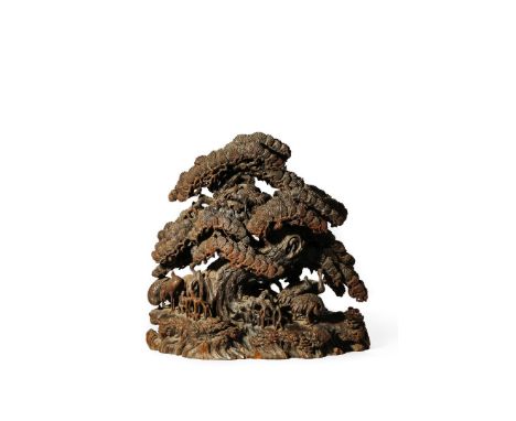 A CHINESE CARVED PINE MODEL OF A PINE TREE, 19TH CENTURY With a large gnarled trunk, the roots extending out of the rocky gro