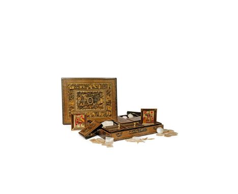 A CHINESE BLACK AND GOLD LACQUER RECTANGULAR GAMES BOX, 19TH CENTURY Containing five smaller rectangular boxes and covers, ea
