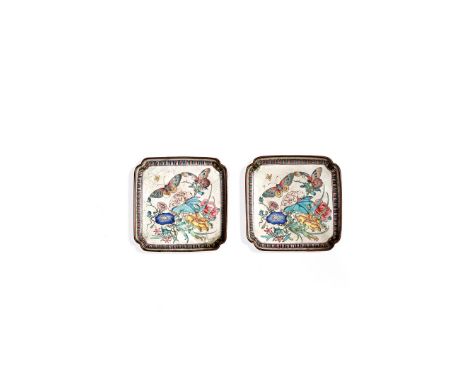 † A RARE PAIR OF CHINESE CANTON ENAMEL FAMILLE ROSE TRAYS, YONGZHENG/QIANLONG Each delicately decorated with butterflies in f