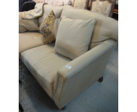 Modern beige upholstered large two seater sofa with various cushions.(B.P. 24% incl. VAT)