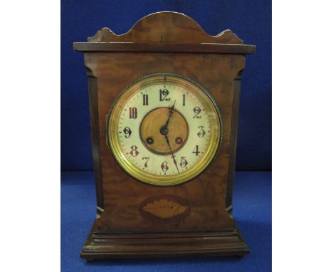 Early 20th Century inlaid mahogany two train mantel clock with enamel chapter ring, shell inlaid motif, with key, appears to 