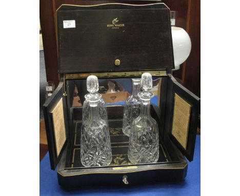 Remy Martin Cognac rectangular decanter box, the hinged front and lid revealing two mallet shaped decanters and stoppers, bra