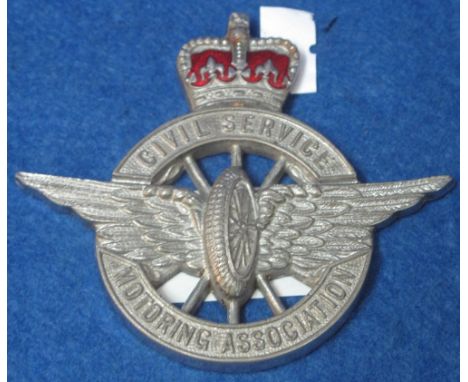 Civil Service Motoring Association plated and red enamel crowned, winged wheel bumper badge.  8cm high.(B.P. 24% incl. VAT)