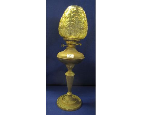 Early 20th Century double burner oil lamp with amber coloured, moulded shade.(B.P. 24% incl. VAT)   CONDITION REPORT:  Amber 