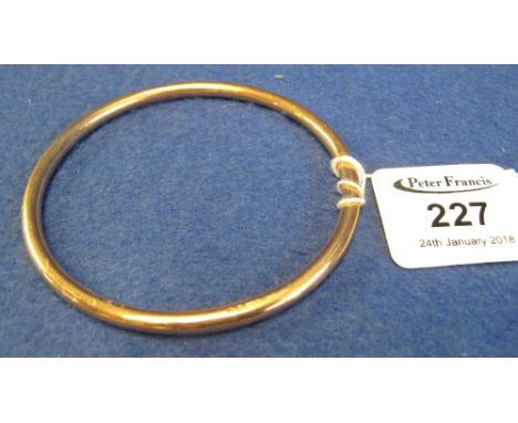 9ct gold lady's bangle, 12.3g approx.(B.P. 24% incl. VAT)Inv. no. 34.