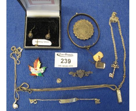 Bag of assorted jewellery to include: silver earrings; ingots; bar brooches; Canadian enamel maple leaf bar brooch; cuff link