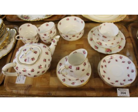 Royal Worcester 15 piece tea service on a white porcelain ground with gilt and rose decoration, together with a Royal Doulton