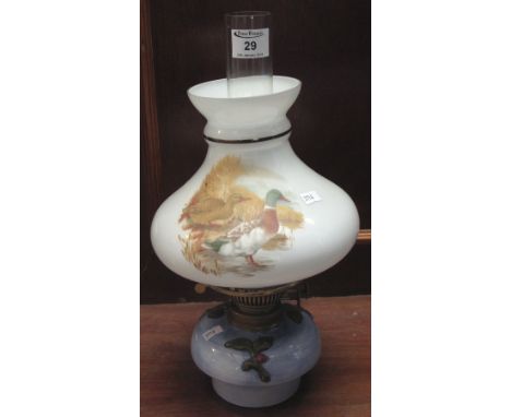 Mid 20th Century small double burner oil lamp with duck design shade and clear glass funnel.(B.P. 24% incl. VAT)