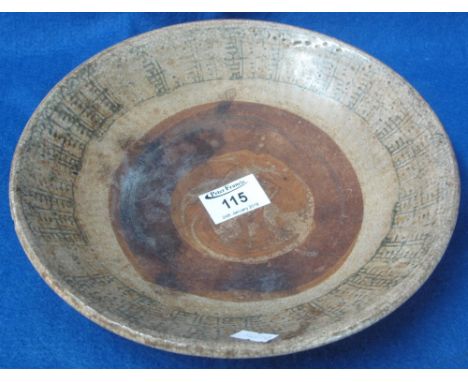 Chinese Provincial stoneware dish with stamp decorated Curvetto unfired underglazed blue, unglazed stacking ring to the well,