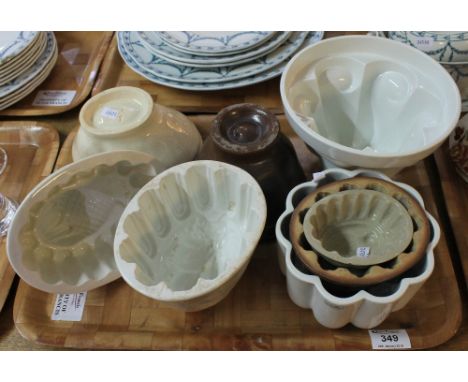Tray of assorted ceramic and stoneware jelly moulds, one in the form of a pineapple. (8)(B.P. 24% incl. VAT)
