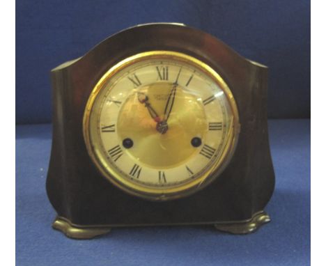 Smith's Enfield two train, arch shaped mantel clock with key and pendulum.(B.P. 24% incl. VAT)