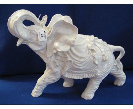 Modern ceramic study of a charging elephant.(B.P. 24% incl. VAT)
